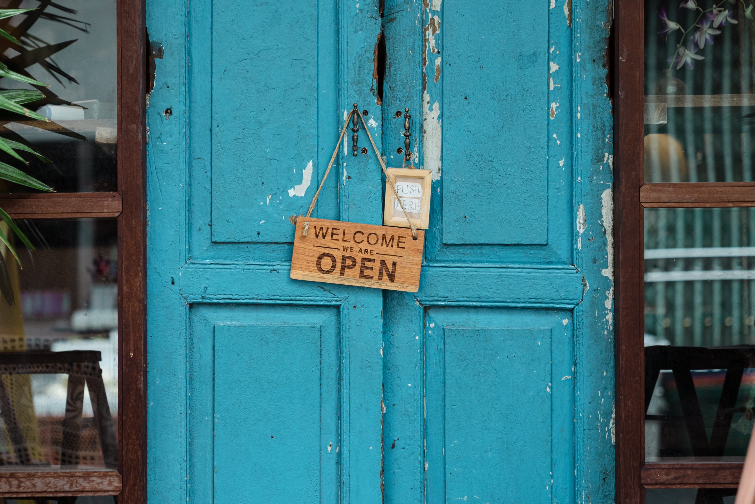 door with open sign displayed